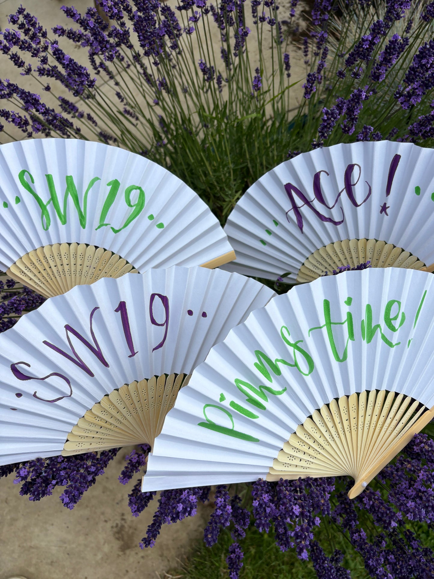 Hand-lettered paper fans