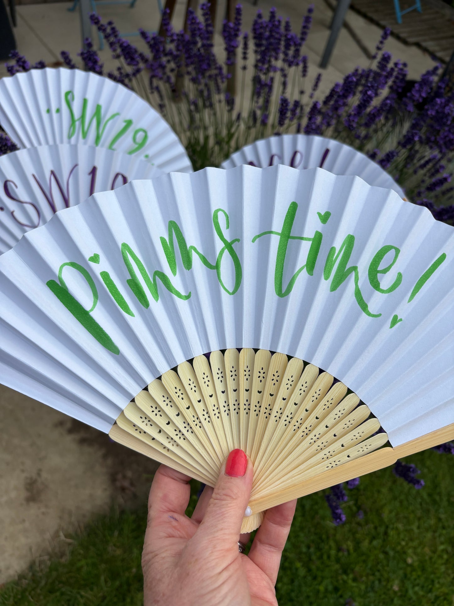 Hand-lettered paper fans