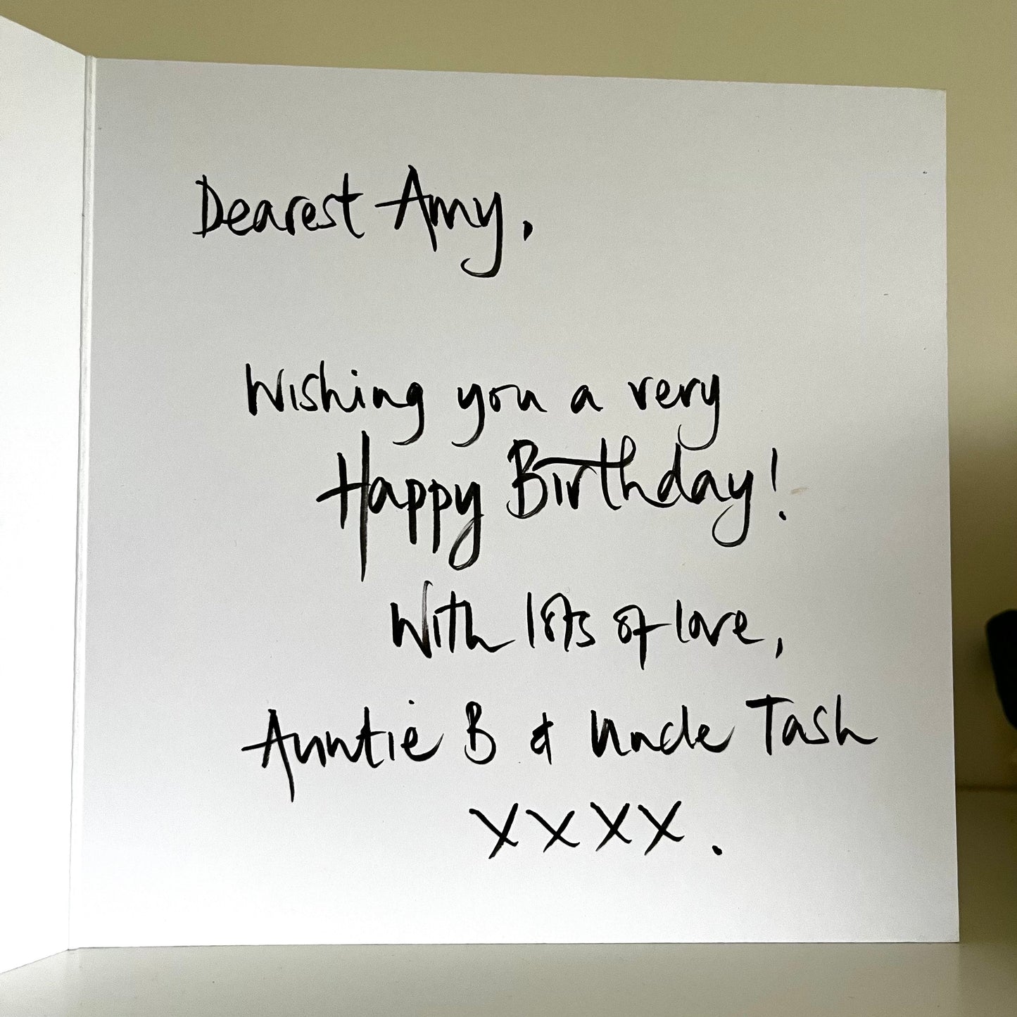 Personalised hand written message inside birthday card